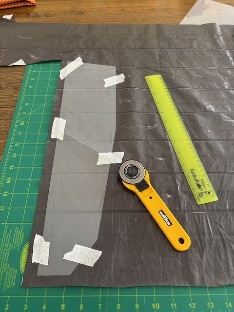 Using the template to cut out the panels.