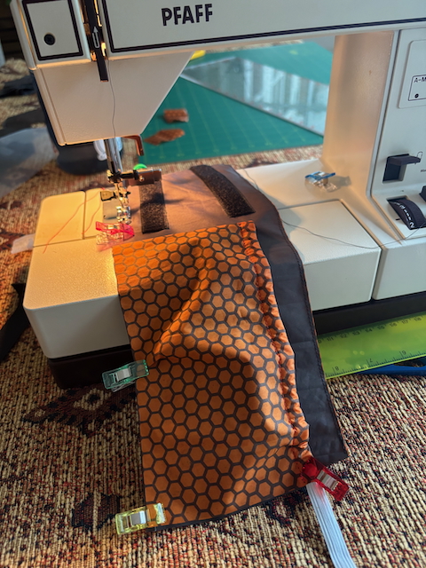 Assembling the first panel with pocket and velcro strips.